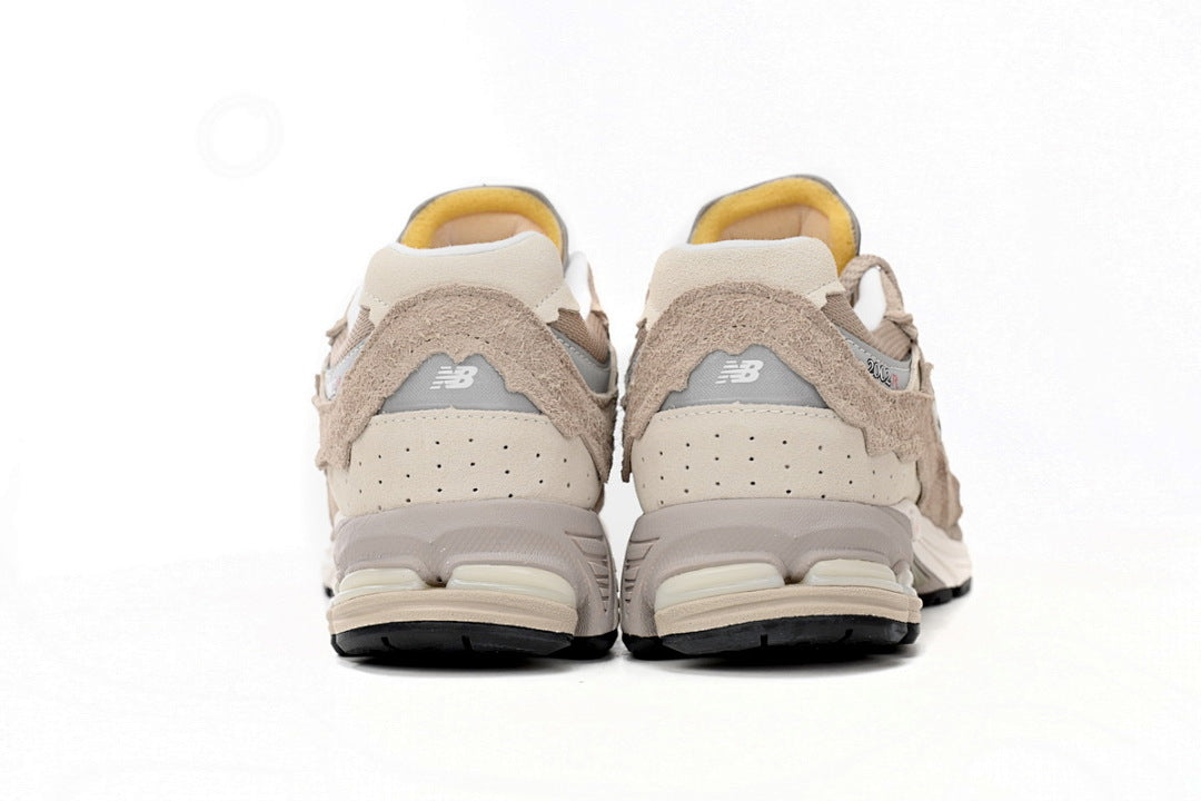 New Balance 2002R M2002RDL Light Khaki Beige Deconstructed Retro Sneakers Women Men