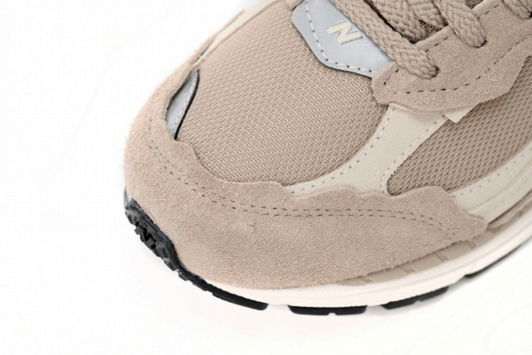 New Balance 2002R M2002RDL Light Khaki Beige Deconstructed Retro Sneakers Women Men